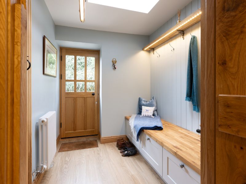 A boot room remodels as part of a full home renovation.
